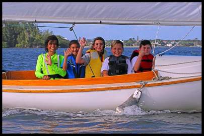 Crew of children waving