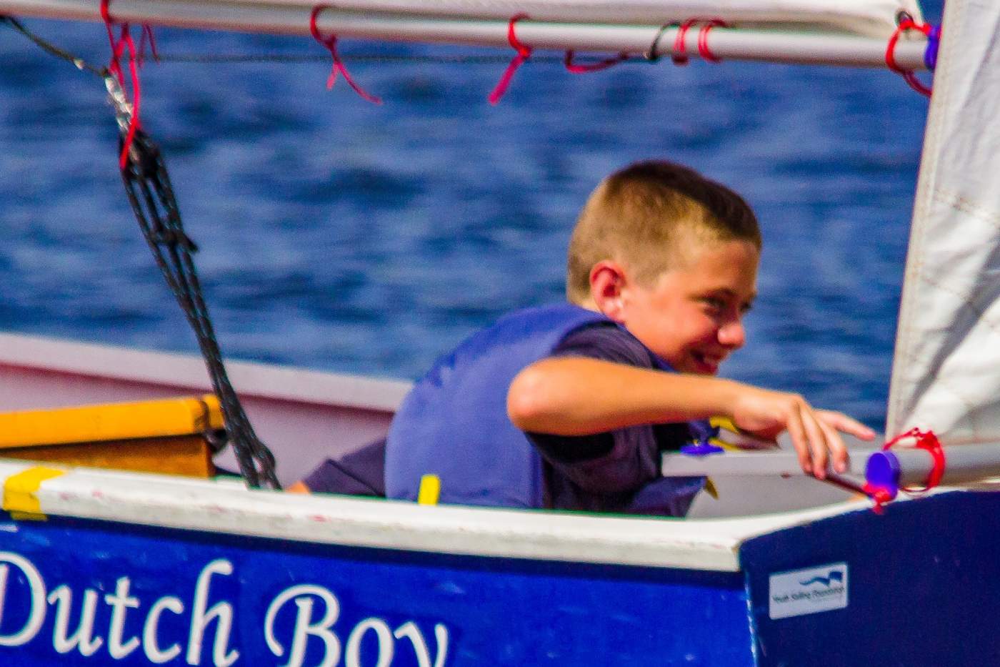 Young sailor in Dutch Boy boat