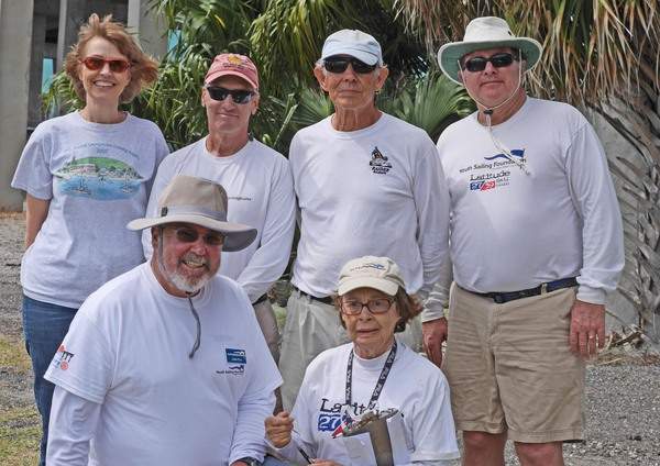Five adults smiling